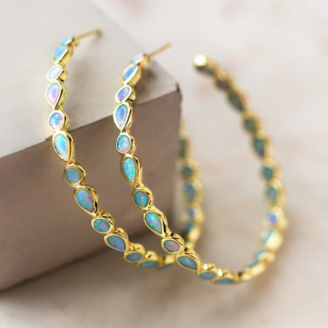 Vintage blauwe opaal gouden oorbellen