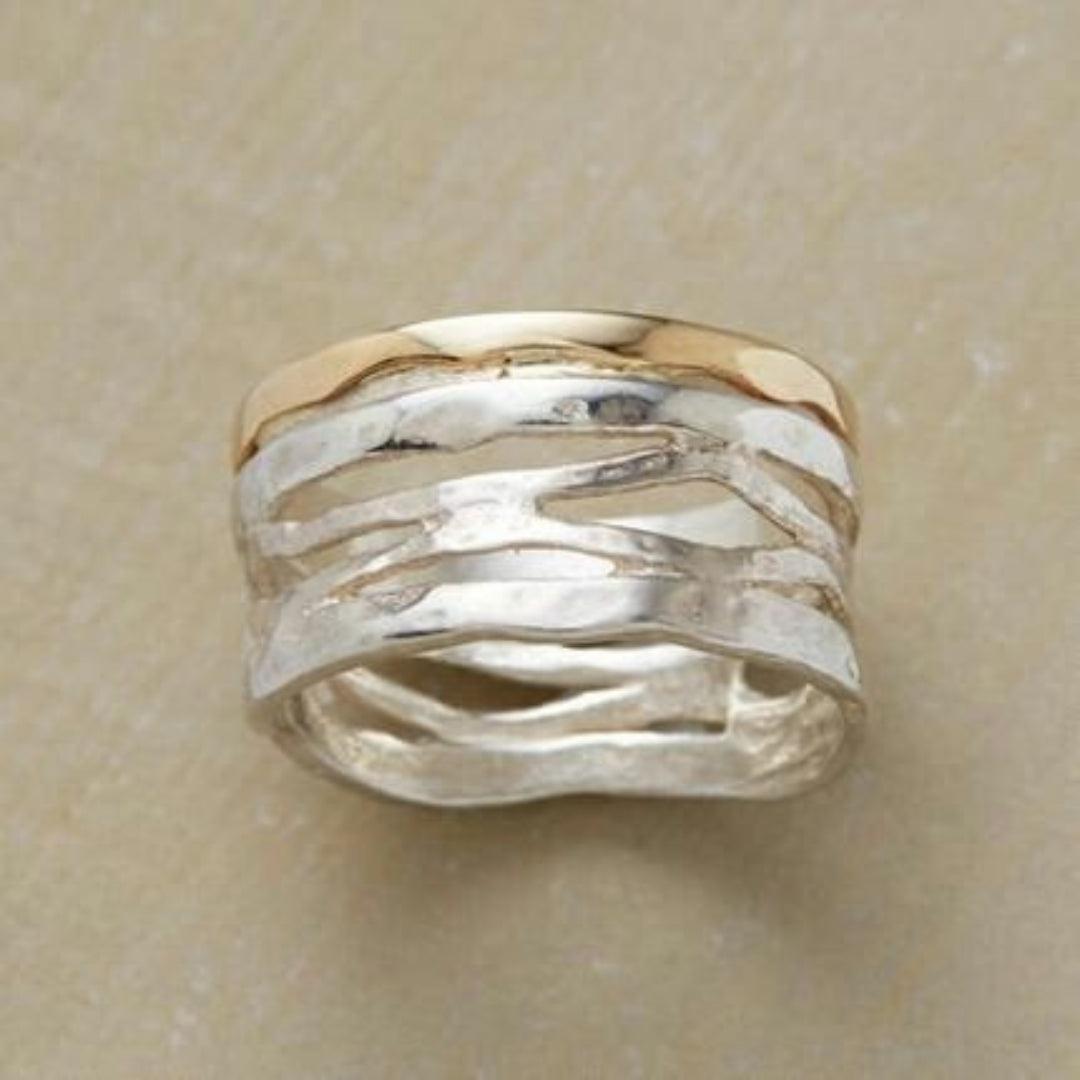 Vintage gouden en zilveren holle ring