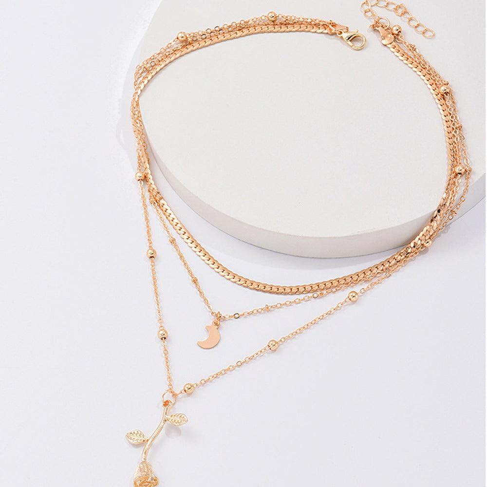 Ketting met gouden rozenhanger