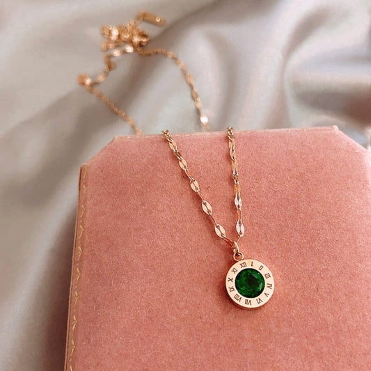 Tijdketting met smaragd in goud