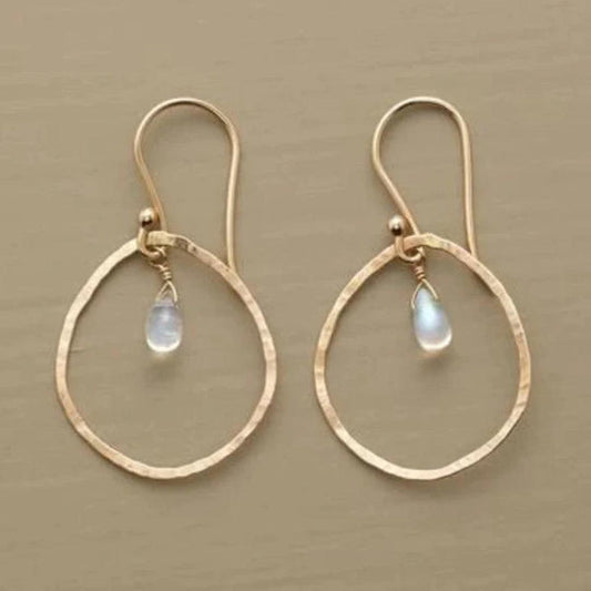 Vintage witte kristallen oorbellen in goud