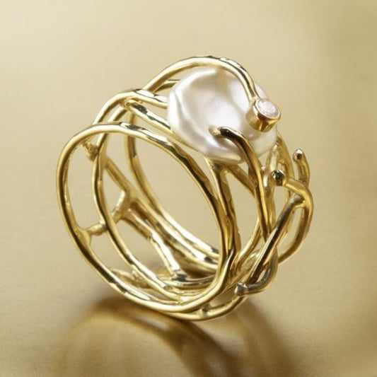 Dunne gouden ring met parel in vintage stijl