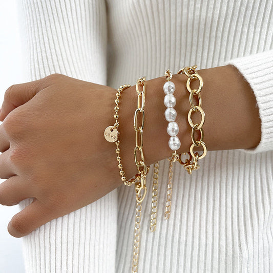 Armbanden met parels in goud