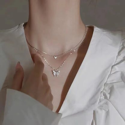 Lina - Meerlagige ketting met vlinderhangers
