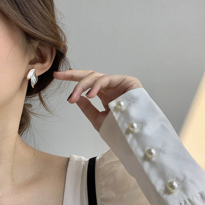 Luxe handbeschilderde emaille oorbellen met geluksvleugels