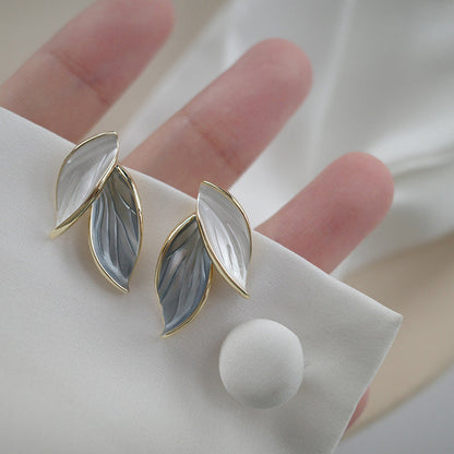 Luxe handbeschilderde emaille oorbellen met geluksvleugels