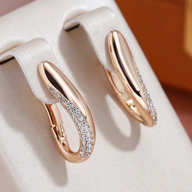 Elegante gouden en glitter oorbellen